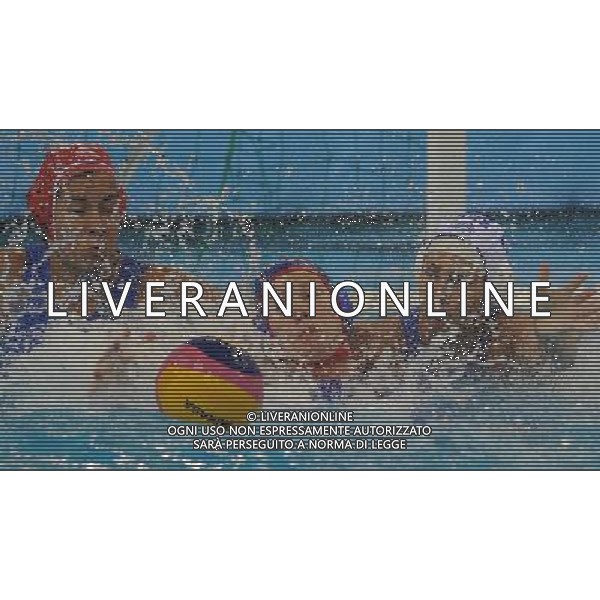 (110721) -- SHANGHAI, July 21, 2011 () -- Ekaterina Lisunova (C) of Russia competes in the preliminary round of women\'s water polo event between Greece and Russia at the 14th FINA World Championships in Shanghai, east China, July 21, 2011. Greece won the match 6-5. (/Wang Yuguo) (sqq)