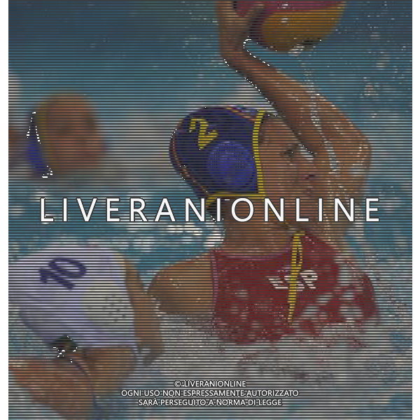 (110721) -- SHANGHAI, July 21, 2011 () -- Blanca Gil Sorli (R) of Spain shoots in the preliminary round of women\'s water polo event between Spain and Brazil at the 14th FINA World Championships in Shanghai, east China, July 21, 2011. Spain won the match 12-4. (/Wang Yuguo) (sqq)