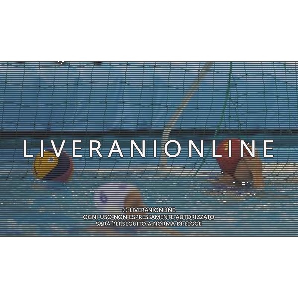 (110721) -- SHANGHAI, July 21, 2011 () -- Tess Oliveira (back) of Brazil reacts after failing to defend a shot in the preliminary round of women\'s water polo event between Spain and Brazil at the 14th FINA World Championships in Shanghai, east China, July 21, 2011. Spain won the match 12-4. (/Wang Yuguo) (sqq)