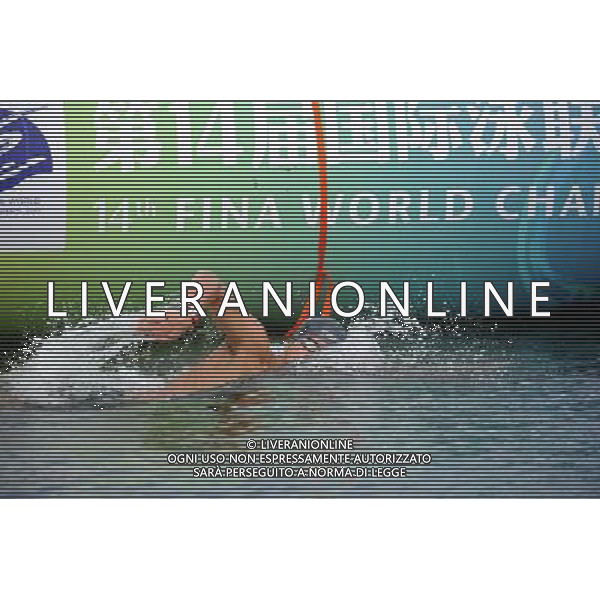 (110721) -- SHANGHAI, July 21, 2011 () -- Zhang Zibin of China competes in the open water 5km team event at the 14th FINA World Championships in Shanghai, east China, July 21, 2011. The Chinese team ranked the 8th with 1:01:02.2. (/Guo Yong) (zgp)