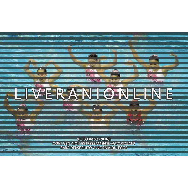 (110721) -- SHANGHAI, July 21, 2011 () -- Swimmers of China compete in the synchronized swimming free combination final at the 14th FINA World Championships in Shanghai, east China, July 21, 2011. The Chinese team won the silver medal with 96.390 points. (/Yang Zongyou)
