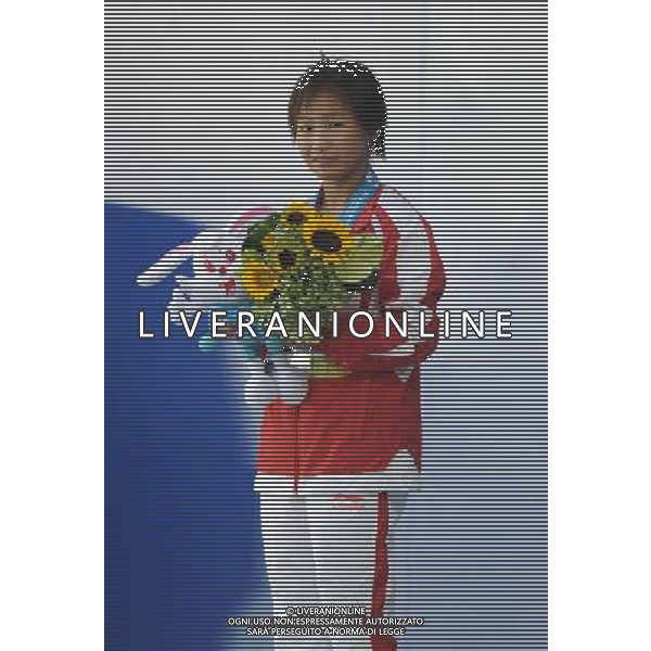 (110721) -- SHANGHAI, July 21, 2011 () -- China\'s Hu Yadan attends the awarding ceremony of the women\'s 10m platform diving event at the 14th FINA World Championships in Shanghai, east China, July 21, 2011. Hu Yadan won the silver medal with 394.00 points. (/Yang Zongyou) (zgp)