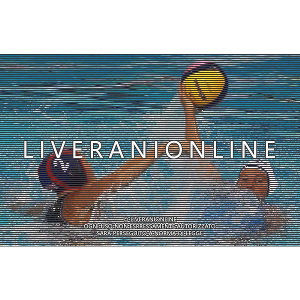 (110721) -- SHANGHAI, July 21, 2011 () -- Heather Danielle Petri (L) of the United States competes in the preliminary round of women\'s water polo event between the United States and the Kazakhstan at the 14th FINA World Championships in Shanghai, east China, July 21, 2011. The United States won the match 14-4. (/Pei Xin) (sqq)