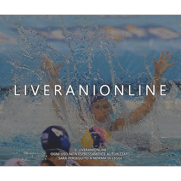 (110721) -- SHANGHAI, July 21, 2011 () --A Hungarian player (back) is seen through water in the preliminary round of women\'s water polo event between Hungary and the Netherlands at the 14th FINA World Championships in Shanghai, east China, July 21, 2011. Hungary drew 9-9 with the Netherlands. (/Wang Yuguo) (sqq)