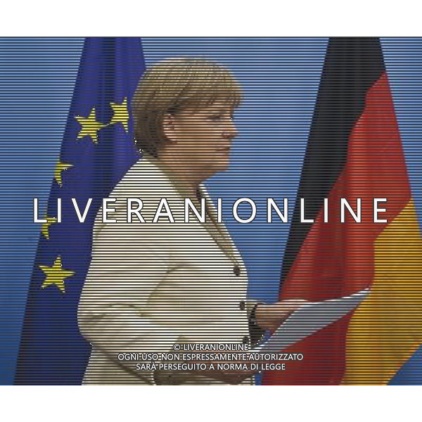 Germany\'s Chancellor Angela Merkel during a news conference at the European Council building at the end of an euro zone leaders crisis summit in Brussels, Belgium on 2011-07-21 by Wiktor Dabkowski
