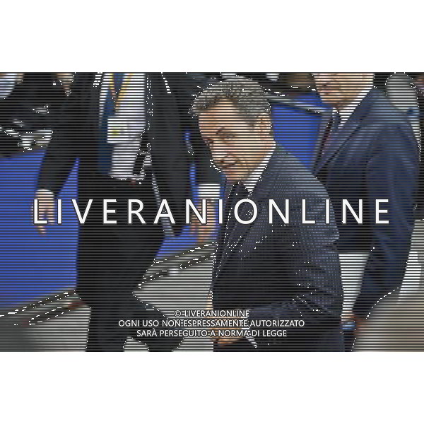 French President Nicolas Sarkozy arrives fot the EU summit at the European Council headquarters in Brussels, Belgium on 2011-07-21 Eurogroup chairman Jean-Claude Juncker said that eurozone leaders would not rule out a Greek debt default but that everything should be done to prevent it. by Wiktor Dabkowski