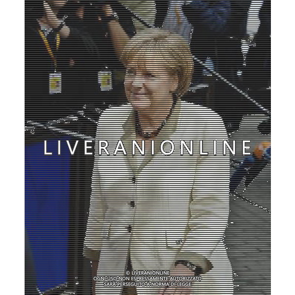 Germany\'s Chancellor Angela Merkel arrives fot the EU summit at the European Council headquarters in Brussels, Belgium on 2011-07-21 Eurogroup chairman Jean-Claude Juncker said that eurozone leaders would not rule out a Greek debt default but that everything should be done to prevent it. by Wiktor Dabkowski