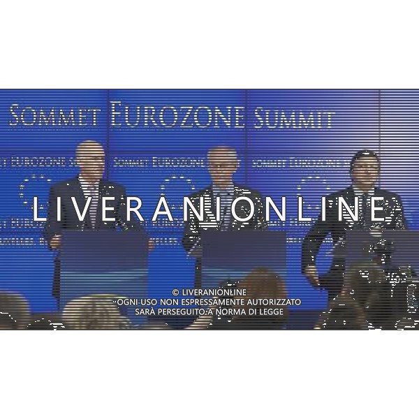 (110721) -- Brussels, July 21, 2011 () -- President of European Commission Jose Manuel Barroso (R), President of European Council Herman Van Rompuy (C) and Greek Prime Minister Georgios Papandreou attend the press conference after the Eurozone Emergency Summit in Brussels, Capital of Belgium, July 21, 2011. Eurozone leaders Thursday agreed on a second bailout package for Greeece, with a total official financing of an estimated 109 billion euros. (/Thierry Monasse)(ww)
