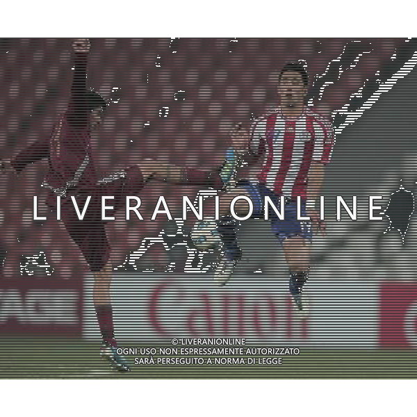 (110721) -- MENDOZA, July 21, 2011 () -- Paraguay\'s Lucas Barrios (R) vies for the ball with Venezuela\'s Franklin Lucena during a semifinal match of Copa Americain Mendoza, Argentina, July 20, 2011. Paraguay won 5-3 on penalties and will face Uruguay in the final. (/David de la Paz)