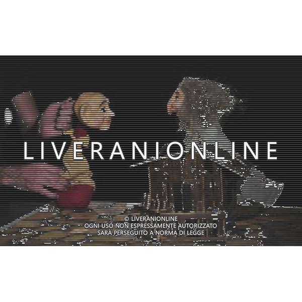 (110721) -- HOLON (ISRAEL), July 21, 2011 () -- An artist performs a traditional puppet show during the 14th International Puppet Theatre and Film Festival in Holon, Israel, July 21, 2011. The annual festival opened on Thursday and extended to 9 days from usual 7 days. (/Yin Dongxun) (wjd)