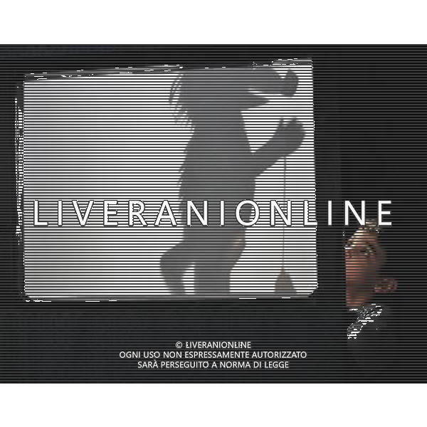 (110721) -- HOLON (ISRAEL), July 21, 2011 () -- A child experiences shadow puppet performance during the 14th International Puppet Theatre and Film Festival in Holon, Israel, July 21, 2011. The annual festival opened on Thursday and extended to 9 days from usual 7 days. (/Yin Dongxun) (wjd)