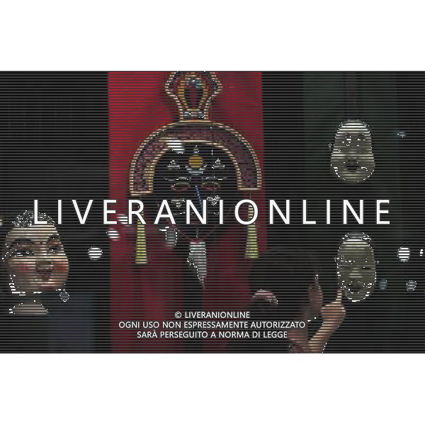 (110721) -- HOLON (ISRAEL), July 21, 2011 () -- A child looks at puppets on display during the 14th International Puppet Theatre and Film Festival in Holon, Israel, July 21, 2011. The annual festival opened on Thursday and extended to 9 days from usual 7 days. (/Yin Dongxun) (wjd)