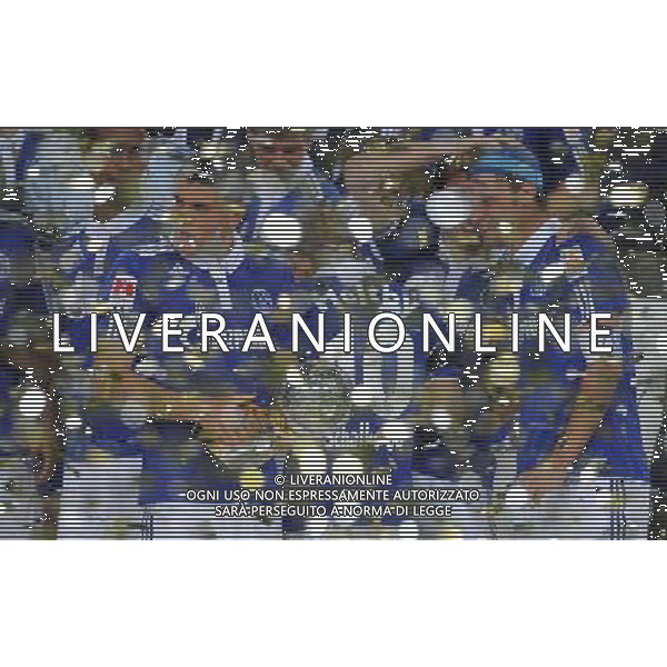 firo : Fußball,Fussball, 23.07.2011 1.BL, 1.Bundesliga, Saison 2011/2012 Supercup 2011, FC SCHALKE 04 - BVB, Borussia Dortmund, 4:3 n.E. Kyriakos PAPADOPOULOS, Schalke, mit SUPERCUP, rechts HÖWEDES $worldrightsEs gelten unsere AGB, einsehbar auf www.firosportphoto.de copyright by firo sportphoto: Pfefferackerstr. 2a  45894 G e l s e n k i r c h e n www.firosportphoto.de mail@firosportphoto.de (V o l k s b a n k B o c h u m - W i t t e n ) BLZ.: 430 601 29 Kt. Nr.: 341 117 100 Tel:  0209 - 9304402 Fax:  0209 - 9304443