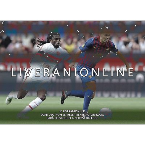 Audi Cup 2011 Bayern Monaco-Barcellona-International Porto Alegre-Milan Monaco Di Baviera (Germania) - 26.07.2011 Barcellona-International Porto Alegre Nella Foto:iniesta-tinga /Ph.Vitez-Ag. Aldo Liverani