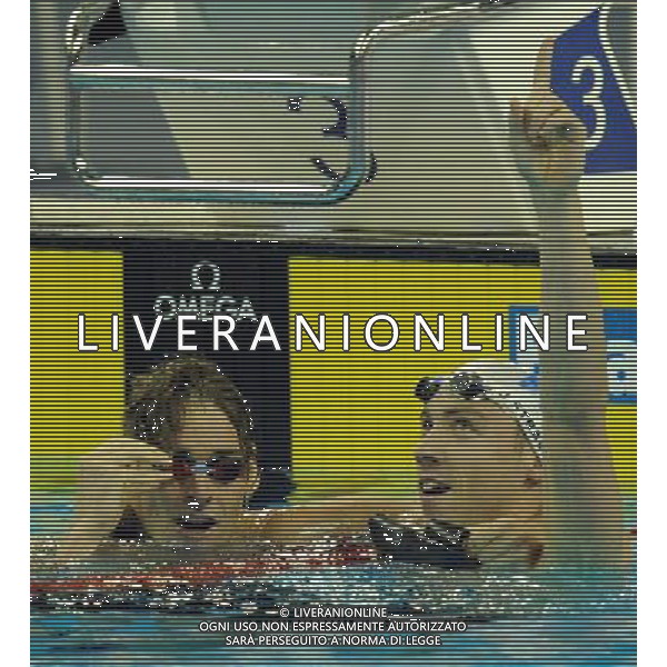 (110726) -- SHANGHAI, July 26, 2011 () -- Camille Lacourt (L) and Jeremy Stravius of France celebrate after the final of men\'s 100m backstroke swimming event at the 14th FINA World Championships in Shanghai, east China, July 26, 2011. Camille Lacourt and Jeremy Stravius of France shared the gold medal with 52.76. (/Yang Zongyou) (zgp)