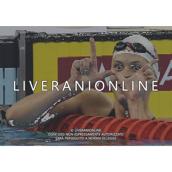 (110726) -- SHANGHAI, July 26, 2011 () -- Lotte Friis of Denmark celebrates after the final of women\'s 1500m freestyle swimming event at the 14th FINA World Championships in Shanghai, east China, July 26, 2011. Lotte Friis of Denmark claimed the title with 15:49.59. (/Yang Lei) (zgp)