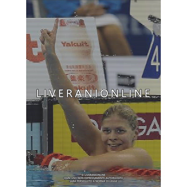 (110726) -- SHANGHAI, July 26, 2011 () -- Lotte Friis of Denmark celebrates after the final of women\'s 1500m freestyle swimming event at the 14th FINA World Championships in Shanghai, east China, July 26, 2011. Lotte Friis of Denmark claimed the title with 15:49.59. (/Yang Lei) (zgp)