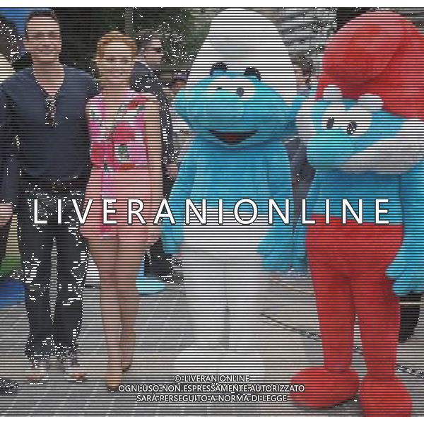 Neil Patrick Harris, Hank Azaria and Jayma Mays at the New York Smurf Week Kick Off Ceremony at Smurfs Village at Merchant\'s Gate, Central Park on July 25, 2011 in New York City.