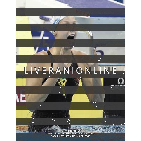 (110727) -- SHANGHAI, July 27, 2011 () -- Federica Pellegrini of Italy celebrates after the final of women\'s 200m freestyle swimming event at the 14th FINA World Championships in Shanghai, east China, July 27, 2011. Federica Pellegrini claimed the title with 1:55.58. (/Fan Jun) (zgp)