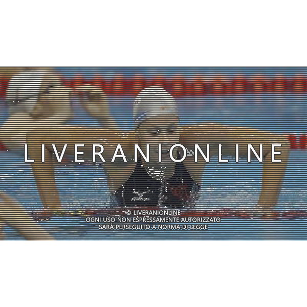 (110727) -- SHANGHAI, July 27, 2011 () -- Federica Pellegrini of Italy reacts after the final of women\'s 200m freestyle swimming event at the 14th FINA World Championships in Shanghai, east China, July 27, 2011. Federica Pellegrini claimed the title with 1:55.58. (/Fei Maohua) (zgp)