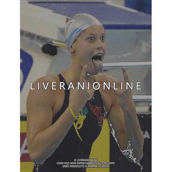 (110727) -- SHANGHAI, July 27, 2011 () -- Federica Pellegrini of Italy celebrates after the final of women\'s 200m freestyle swimming event at the 14th FINA World Championships in Shanghai, east China, July 27, 2011. Federica Pellegrini claimed the title with 1:55.58. (/Guo Yong) (zgp)
