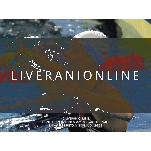(110727) -- SHANGHAI, July 27, 2011 () -- Federica Pellegrini (front) of Italy celebrates after the final of women\'s 200m freestyle swimming event at the 14th FINA World Championships in Shanghai, east China, July 27, 2011. Federica Pellegrini claimed the title with 1:55.58. (/Ren Long) (zgp)