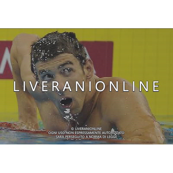 (110727) -- SHANGHAI, July 27, 2011 () -- Michael Phelps of the United States reacts after the final of men\'s 200m butterfly swimming event at the 14th FINA World Championships in Shanghai, east China, July 27, 2011. Michael Phelps claimed the title with 1:53.34. (/Guo Yong) (zgp)