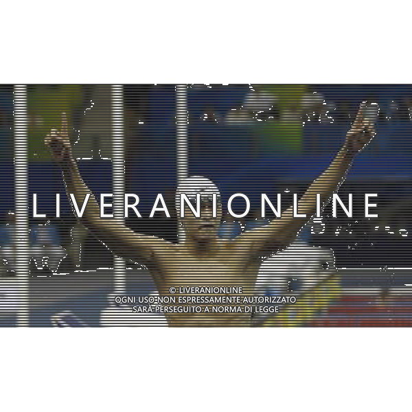 (110727) -- SHANGHAI, July 27, 2011 () -- Sun Yang of China celebrates after the final of men\'s 800m freestyle swimming event at the 14th FINA World Championships in Shanghai, east China, July 27, 2011. Sun Yang claimed the title with 7:38.57. (/Fei Maohua) (zgp)