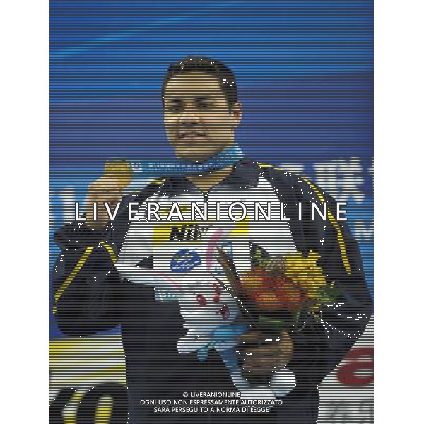 (110727) -- SHANGHAI, July 27, 2011 () -- Felipe Alves Franca Da Silva of Brazil poses in the awarding ceremony of men\'s 50m breaststroke swimming event at the 14th FINA World Championships in Shanghai, east China, July 27, 2011. Felipe Alves Franca Da Silva claimed the title with 27.01. (/Guo Yong) (sqq)