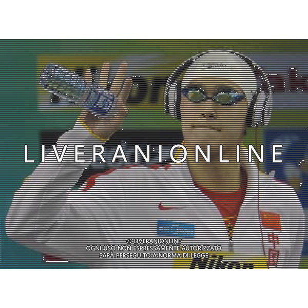 (110727) -- SHANGHAI, July 27, 2011 () -- Sun Yang of China waves to spectators before the final of men\'s 800m freestyle swimming event at the 14th FINA World Championships in Shanghai, east China, July 27, 2011. Sun Yang claimed the title with 7:38.57. (/Guo Yong) (zgp)