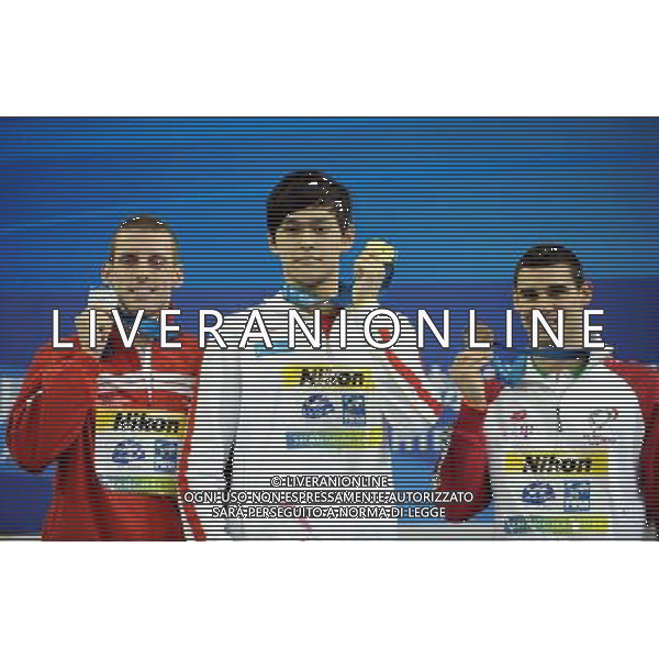 (110727) -- SHANGHAI, July 27, 2011 () -- Sun Yang (C) of China, Ryan Cochrane (L) of Canada, and Gergo Kis of Hungary pose in the awarding ceremony of men\'s 800m freestyle swimming event at the 14th FINA World Championships in Shanghai, east China, July 27, 2011. Sun Yang claimed the title with 7:38.57. Ryan Cochrane won the silver medal with 7:41.86. Gergo Kis got the bronze medal with 7:44.94. (/Guo Yong) (sqq)