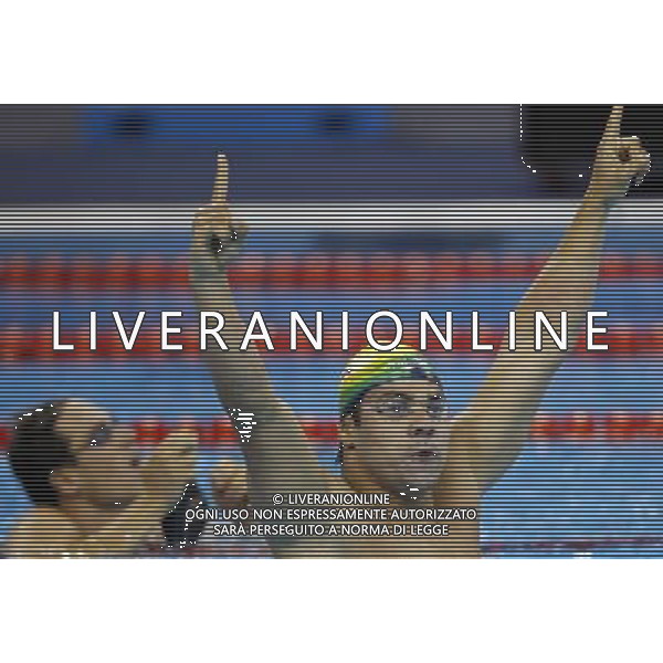 (110727) -- SHANGHAI, July 27, 2011 () -- Felipe Alves Franca Da Silva of Brazil (R) celebrates after the final of men\'s 50m breaststroke swimming event at the 14th FINA World Championships in Shanghai, east China, July 27, 2011. Felipe Alves Franca Da Silva claimed the title with 27.01. (/Fei Maohua) (zgp)