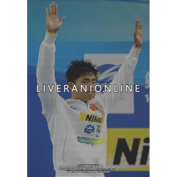 (110727) -- SHANGHAI, July 27, 2011 () -- Wu Peng of China poses in the awarding ceremony of men\'s 200m butterfly swimming event at the 14th FINA World Championships in Shanghai, east China, July 27, 2011. Wu Peng got the bronze medal with 1:54.67. (/Guo Yong) (sqq)