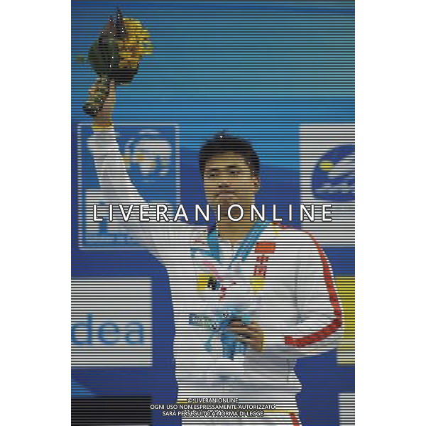 (110727) -- SHANGHAI, July 27, 2011 () -- Wu Peng of China poses in the awarding ceremony of men\'s 200m butterfly swimming event at the 14th FINA World Championships in Shanghai, east China, July 27, 2011. Wu Peng got the bronze medal with 1:54.67. (/Guo Yong) (sqq)