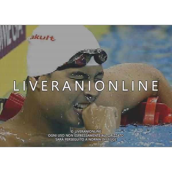 (110727) -- SHANGHAI, July 27, 2011 () -- Wu Peng of China reacts after the final of men\'s 200m butterfly swimming event at the 14th FINA World Championships in Shanghai, east China, July 27, 2011. Wu Peng won the bronze medal with 1:54.67. (/Fei Maohua) (zgp)