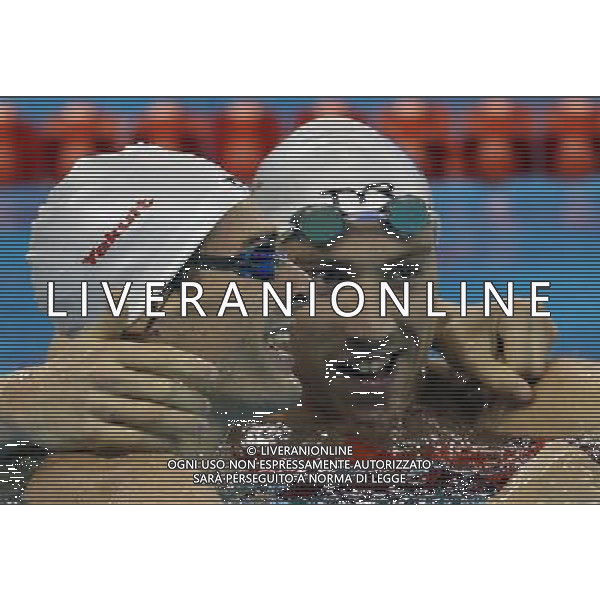 (110726) -- SHANGHAI, July 26, 2011 () -- Camille Lacourt (L) and Jeremy Stravius of France celebrate after the final of men\'s 100m backstroke swimming event at the 14th FINA World Championships in Shanghai, east China, July 26, 2011. Camille Lacourt and Jeremy Stravius of France shared the gold medal with 52.76. (/Fei Maohua) (zgp)