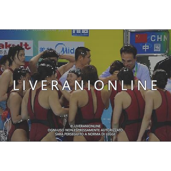 (110727) -- SHANGHAI, July 27, 2011 () -- Players of China celebrate after winning the semifinal of women\'s water polo event against Russia at the 14th FINA World Championships in Shanghai, east China, July 27, 2011. China won the match 13-12.(/Guo Yong) (sqq)