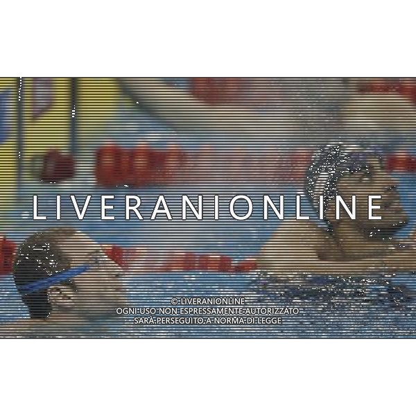 (110727) -- SHANGHAI, July 27, 2011 () -- William Meynard (L) of France reacts after the semi-final of men\'s 100m freestyle swimming event at the 14th FINA World Championships in Shanghai, east China, July 27, 2011. William Meynard ranked third and entered the final. (/Fei Maohua) (zgp)