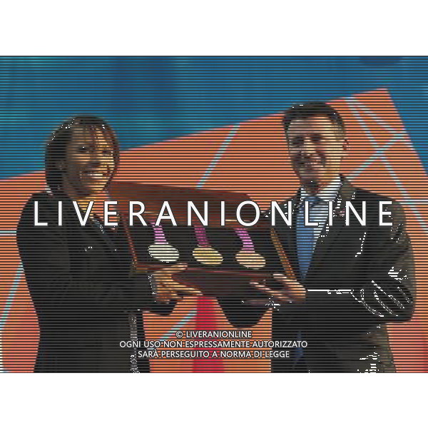 (110728) -- LONDON, July 28, 2011 () -- London Organising Committee for the Olympic Games (LOCOG) chairman Sebastian Coe (R) and retired British Olympic champion Kelly Holmes display the medals at the \'London 2012 - One Year To Go\' celebration at the Trafalgar Square in central London, Britain, July 27, 2011. London celebrated the one year countdown to the London 2012 Olympic games here on Wednesday, and the medals were displayed to the public for the first time. (/Zeng Yi)