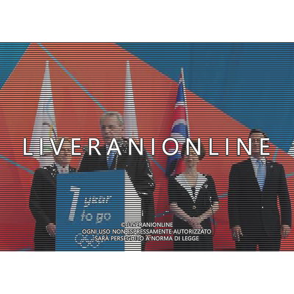 (110728) -- LONDON, July 28, 2011 () -- International Olympic Committee (IOC) President Jacques Rogge (Front) speaks at the \'London 2012 - One Year To Go\' celebration, while IOC\'s coordination committee for the 2012 Summer Olympics president Denis Oswald (1st L, Back), Princess Anne (2nd R, Back) and British Prime Minister David Cameron (1st R, Back) look on at the Trafalgar Square in central London, Britain, July 27, 2011. London celebrated the one year countdown to the London 2012 Olympic games here on Wednesday. (/Zeng Yi)
