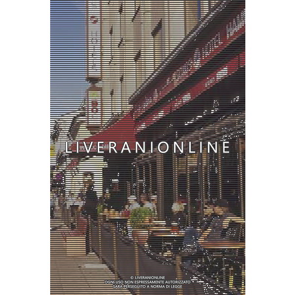 People sitting at the tables outside a cafe, Turku, Finland Turku is the 2011 European Capital of Culture