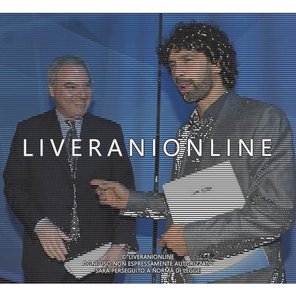 MILANO 27/7/2011 STUDI TELEVISIVI DI SPORT ITALIA VIA FELTRE PERESENTAZIONE DEL CALENDARIO DELLA SERIE A TIM 2011/2012 NELLA FOTO MAURIZIO BERETTA E DAMIANO TOMMASI FOTO ROMANO/AG ALDO LIVERANI