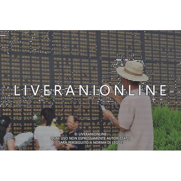 (110728) -- TANGSHAN, July 28, 2011 () -- An aged person searches the name of his relative at a memorial wall in Tangshan, north China\'s Hebei Province, July 28, 2011. People from all walks of life came to a memorial park Thursday in Tangshan to commemorate the 35th anniversary of the Tangshan earthquake happened in 1976. (/Gao Wei)(mcg)
