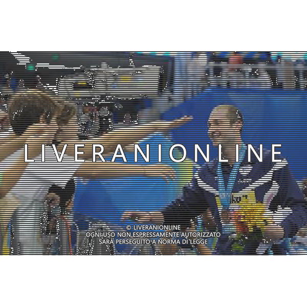 (110728) -- SHANGHAI, July 28, 2011 () -- William Meynard of France receives congratulations after the awarding ceremony of men\'s 100m freestyle swimming event at the 14th FINA World Championships in Shanghai, east China, July 28, 2011. William Meynard got the bronze medal with 48.00. (/Yang Lei) (sqq)