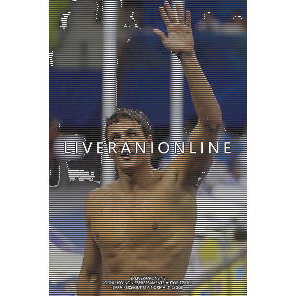 (110728) -- SHANGHAI, July 28, 2011 () -- Ryan Lochte of the United States waves to spectators after the final of men\'s 200m individual medley swimming event at the 14th FINA World Championships in Shanghai, east China, July 28, 2011. Ryan Lochte claimed the title and set a new world record with 1:54.00. (/Fei Maohua) (zgp)