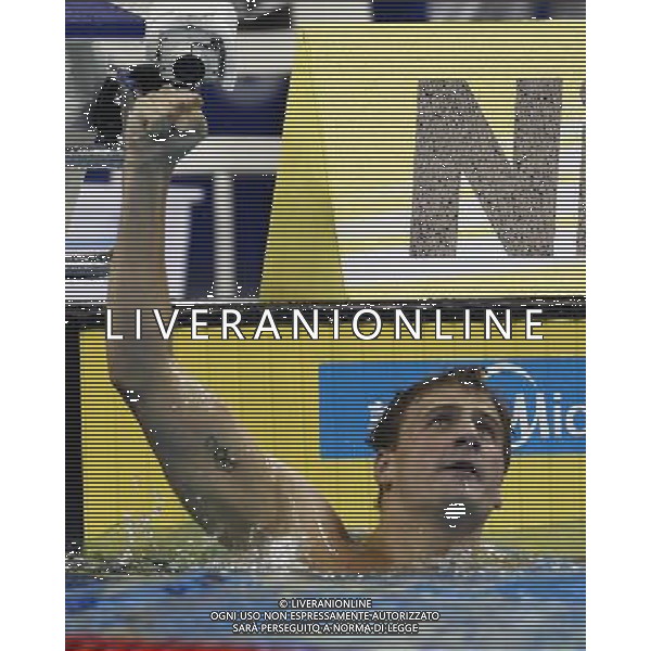 (110728) -- SHANGHAI, July 28, 2011 () -- Ryan Lochte of the United States celebrates after the final of men\'s 200m individual medley swimming event at the 14th FINA World Championships in Shanghai, east China, July 28, 2011. Ryan Lochte claimed the title and set a new world record with 1:54.00. (/Ren Long) (zgp)