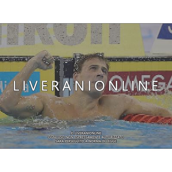 (110728) -- SHANGHAI, July 28, 2011 () -- Ryan Lochte of the United States celebrates after the final of men\'s 200m individual medley swimming event at the 14th FINA World Championships in Shanghai, east China, July 28, 2011. Ryan Lochte claimed the title and set a new world record with 1:54.00. (/Fan Jun) (zgp)