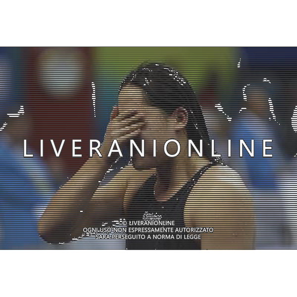 (110728) -- SHANGHAI, July 28, 2011 () -- Liu Zige of China reacts after the final of women\'s 200m butterfly swimming event at the 14th FINA World Championships in Shanghai, east China, July 28, 2011. Liu Zige won the bronze medal with 2:05.90. (/Fei Maohua) (zgp)