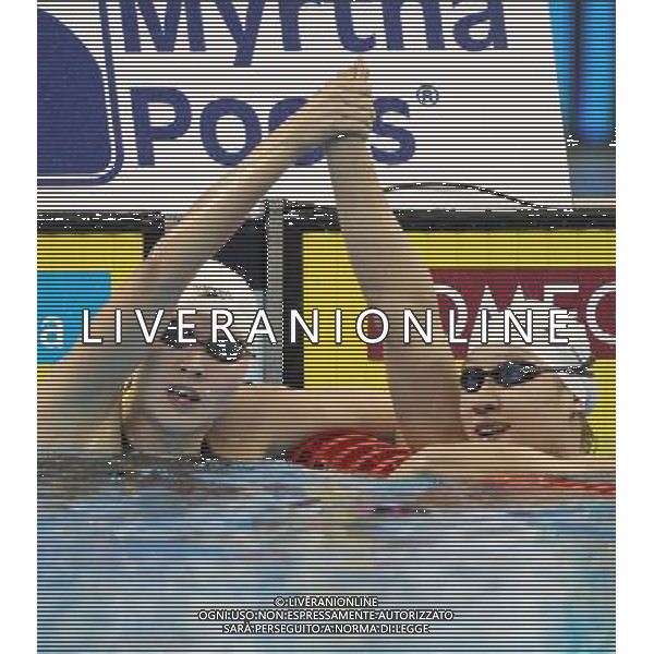 (110728) -- SHANGHAI, July 28, 2011 () -- Jiao Liuyang (L) and Liu Zige of China celebrate after the final of women\'s 200m butterfly swimming event at the 14th FINA World Championships in Shanghai, east China, July 28, 2011. Jiao Liuyang of China claimed the title with 2:05.55. Liu Zige won the bronze medal with 2:05.90. (/Fan Jun) (zgp)