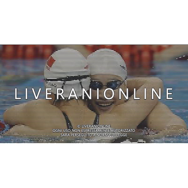 (110728) -- SHANGHAI, July 28, 2011 () -- Jiao Liuyang (L) and Liu Zige of China celebrate after the final of women\'s 200m butterfly swimming event at the 14th FINA World Championships in Shanghai, east China, July 28, 2011. Jiao Liuyang of China claimed the title with 2:05.55. Liu Zige won the bronze medal with 2:05.90. (/Fei Maohua) (zgp)